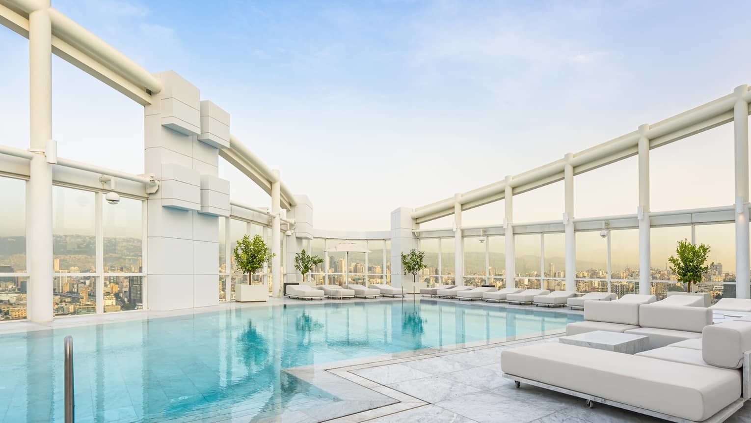 news-main-beiruts-highest-rooftop-pool-bar-and-loungs-reopens-at-four-seasons-hotel-beirut-with-a-refreshed-look-by-bernard-khoury.1561385180.jpg